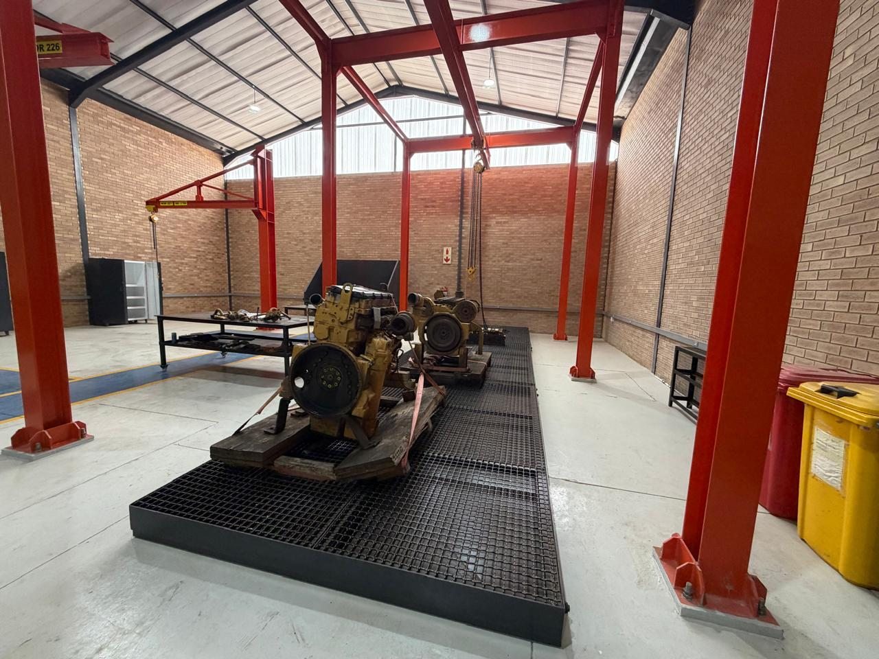 Big Struqtive Holding workshop with red gantry crane